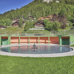 Preserving Heritage Hues KEIM Paint Restoration in Adelboden Swimming Pool